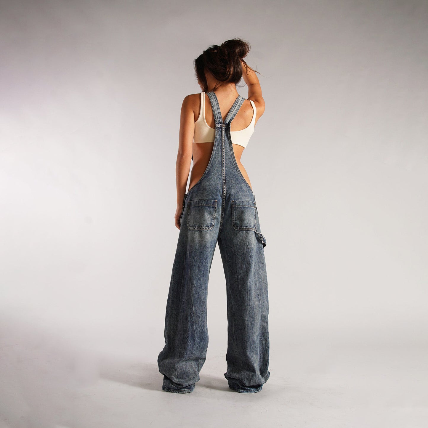 This Y2K Zipper Denim Overall is a popular item on many shopping platforms, characterized by its loose, wide-leg fit, zipper details, and streetwear style